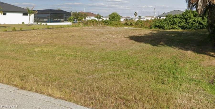 Build your new home on this oversized triple lot in the growing NW Cape Coral area. This property offers plenty of space for your custom home, pool, and outdoor living area. Conveniently located near shopping, dining, schools, parks, and everyday amenities, with easy access to the rest of Cape Coral. Whether you're ready to build now or invest for the future, this is a great opportunity to own an oversized homesite in a growing neighborhood.