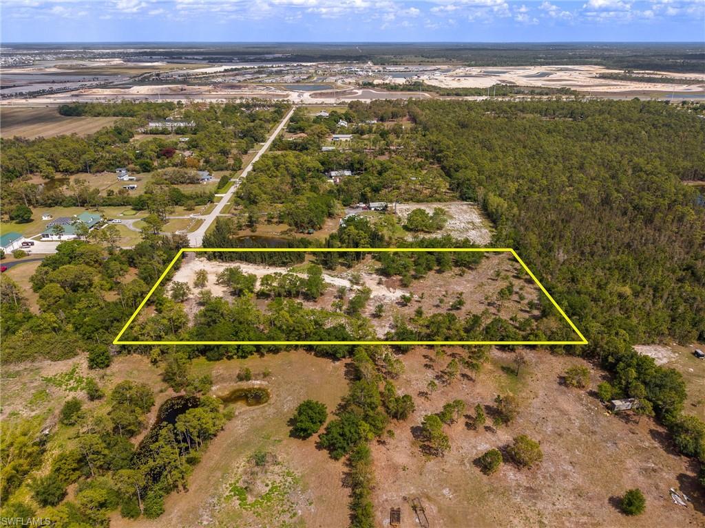A property like this is rarely available, five breathtaking acres of unspoiled Florida landscape, quietly tucked away at the end of a peaceful cul-de-sac, where time slows down and possibility expands. At 11540 Fox Hill Rd, you’re not simply purchasing land, you’re claiming the setting for a future legacy, where your custom estate can rise from a backdrop of towering trees, open skies, and complete privacy.

Imagine designing your dream home to embrace golden sunsets, the soothing rhythm of nature, and endless room to bring your vision to life, with ample space for a guest house, barn, workshop, or whatever you’ve yet to dream up. This is the kind of property that invites freedom, room for your boats, RVs, toys, and a lifestyle that simply isn’t possible in traditional neighborhoods.

Despite its secluded, countryside ambiance, this property is ideally positioned just minutes from the vibrant energy of Babcock Ranch, one of Southwest Florida’s most exciting and innovative communities, offering dining, entertainment, events, and modern conveniences at your fingertips. Nearby access to Sweetwater Marina adds another layer of lifestyle appeal, perfect for those who crave privacy on land while remaining close to recreation and adventure.

Whether you envision a luxurious private compound, a multi-generational retreat, or a personal sanctuary removed from the noise of city life, this is a once-in-a-generation opportunity to secure a piece of land that truly has it all, location, scale, natural beauty, and limitless potential. Opportunities like this don’t come around twice, this is your moment to create something extraordinary.