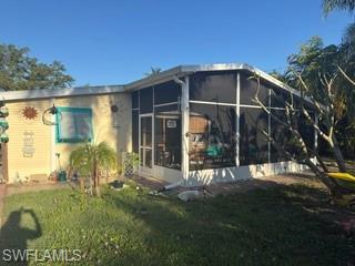 Welcome to your own piece of paradise in Bokeelia, Florida! This charming single family home boasts 2 bedrooms, 1 bathroom, and a prime location near the Gulf of Mexico. Imagine waking up each morning and taking a short stroll to the nearby fishing pier to catch your dinner or enjoying a delicious meal at one of the local restaurants. The landscaped yard with a beautiful mango tree adds to the Florida feel of this quaint home, creating a serene and tropical oasis. With extra outbuildings and a covered parking area connected to a workshop, there is plenty of space for all of your hobbies and projects. The wooded area next to the property provides added privacy, making this home the perfect retreat from the hustle and bustle of everyday life. Whether you are looking for a peaceful getaway or a permanent residence, this home offers the best of both worlds. Don't miss out on the opportunity to own a piece of paradise in Bokeelia - schedule a showing today and make this dream home yours!  This house and surrounding area has never flooded!