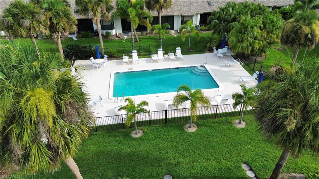 Welcome to the beautiful gated community of Cinnamon Cove, ideally located just 3 miles from Fort Myers Beach and the Sanibel-Captiva Causeway, offering easy access to Southwest Florida's world-famous beaches, shelling, boating, dining, and shopping. This wonderfully upgraded and thoughtfully designed, move-in ready home showcases quality craftsmanship and custom finishes throughout. The stunning custom kitchen is the centerpiece of the home, featuring premium cabinetry, elegant countertops, stainless steel appliances, wine fridge and an open layout that flows seamlessly into the spacious living and dining area—perfect for entertaining. Ceramic tile flooring extends throughout the entire home, providing a clean, cohesive look that's both stylish and low maintenance. Plantation shutters on the windows add timeless character while offering privacy and abundant natural light. The primary suite is a true retreat, highlighted by a spectacular custom-designed and expansive walk-in shower. This spa-inspired renovation required extensive plumbing upgrades and features premium finishes, creating a luxurious everyday experience. The custom walk-in closet includes built-in shelving and organization systems that maximize both storage and functionality. Guests will appreciate their own private suite, complete with a spacious walk-in closet and an en-suite bathroom all tucked discreetly behind a pocket door, providing exceptional comfort and privacy. Additional custom features include a cleverly concealed "secret" door leading to the separate laundry room, blending functionality with thoughtful design and an enclosed back lanai overlooking your quads own private pool. Every detail of this home has been carefully considered, offering a unique combination of style, comfort, and quality that is rarely found. This exceptional property is truly one you need to experience in person.

Taxes are approximately $3200 a year, $2600 if homesteaded. Being sold TURNKEY. HOA is $605 a month and includes flood insurance.