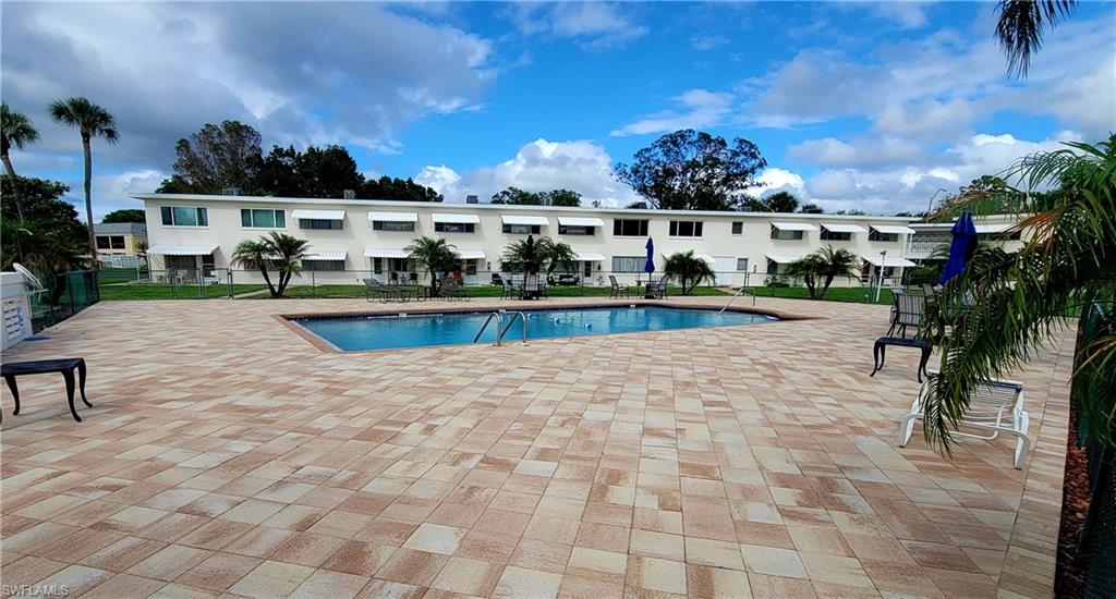 2 Bedroom Golfview condo in move-in condition and being sold furnished. Well maintained unit with laminate floors in the living area and carpet in the bedrooms. All kitchen appliances included. Excellent views of the common area, pool and golf course, pavers surround the large pool area with plenty of deck space, covered and deeded carport parking space, common laundry room with storage closet for each unit. 55+ community, small pets allowed. Low monthly condo fee covers all exterior maintenance including the roof. Not located in a flood zone.