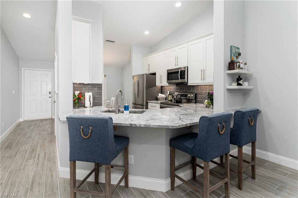 LAUREL OAKS AT PELICAN BAY - Residential