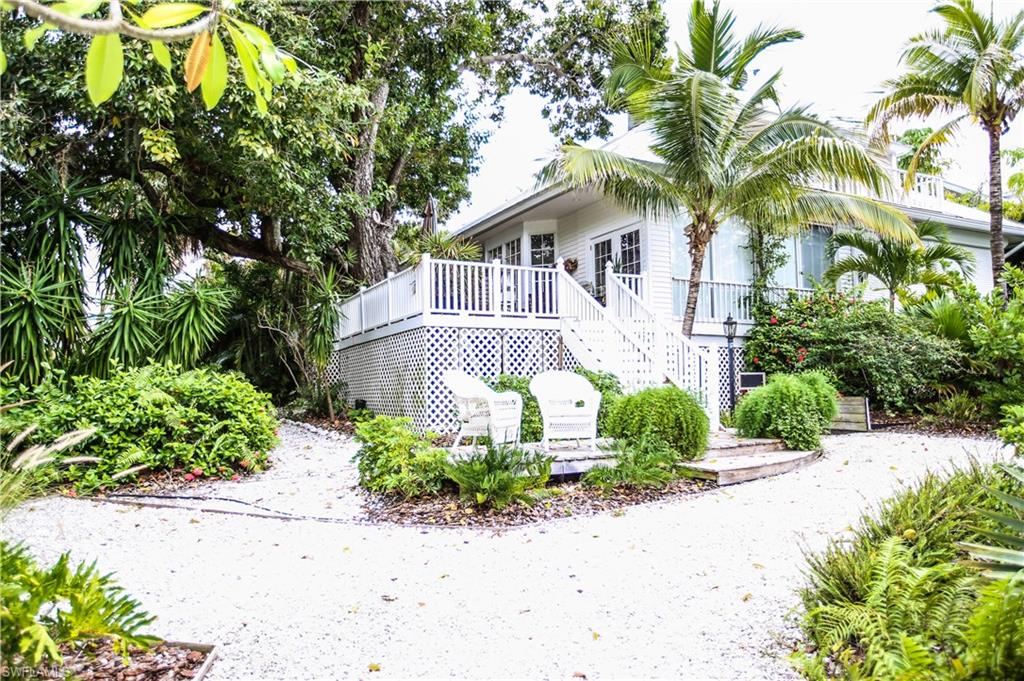 Casa Veranda Cottage is nestled under an age-old Oak on Useppa’s historic Pink Path, surrounded by tropical foliage.  This 2 bedroom/2bath Attached Villa is reminiscent of Old Florida, romantically decorated in shabby chic with hardwood floors and Master Suite on the main floor; carpet and guest room on the second.  Fashionable new kitchen and bathrooms.  Enjoy outdoor living and gorgeous sunsets across the ICW from the expansive Veranda.
Useppa Island is a mile-long bridgeless private island and club with resort amenities and fun boating community, situated between Boca Grande and Captiva, 5 minutes from deep water access.