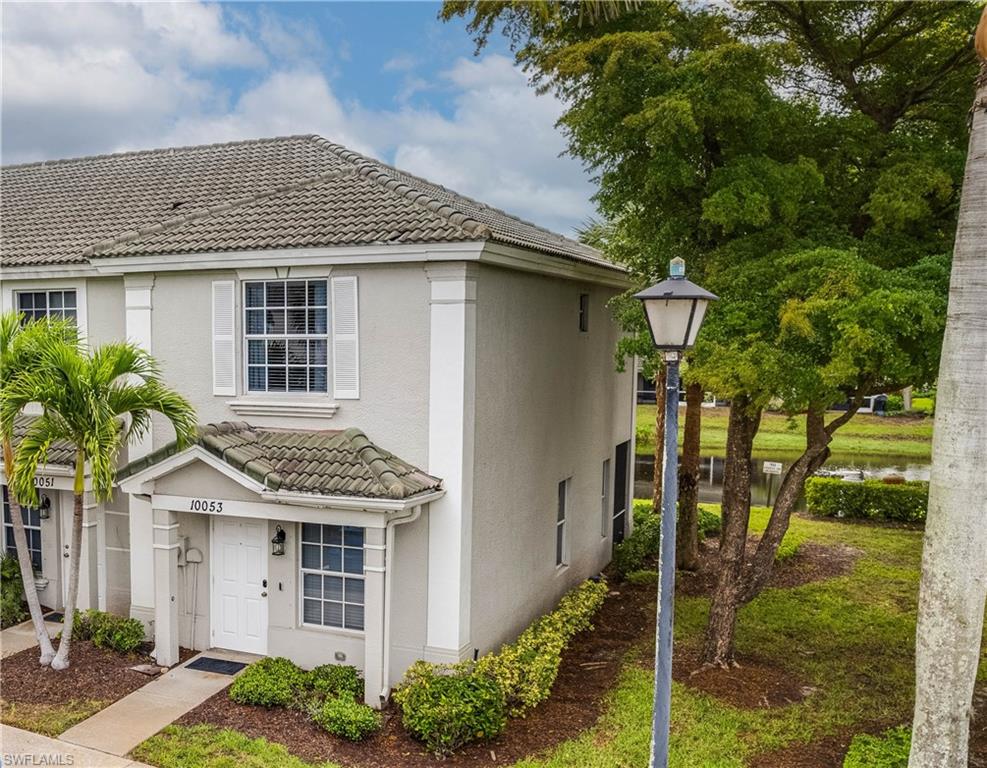 Beautifully updated 2BR/2.5BA END-UNIT townhome with a LAKE VIEW in the gated Cypress Landing community- in the heart of Fort Myers. End units with lake view are hard to find, and offer added privacy & natural light. The open living and dining area opens to a screened lanai overlooking the lake. The renovated KITCHEN features granite countertops, white cabinetry, stainless steel Samsung appliances, an eat-in counter, and an added cabinet with a built-in wine fridge. The 1st floor boasts 2023 luxury vinyl flooring and includes a convenient half bath. Throughout the home you'll find new blinds, LED lighting, new fans, and updated switches and outlets - with smartphone control of the lights, A/C, and door lock. Upstairs features newer plush carpet, LED can lighting, and 2 spacious PRIMARY SUITES. The main suite offers a huge WALK IN closet and a REMODELED BATH with a dual-sink granite vanity, walk-in tiled shower, new toilet, and new ceramic tile flooring. The 2nd suite includes a walk-in closet and private bath. Major updates include a 2021 AC and 2026 water heater. The screened lanai features faux grass flooring, sliding screen shades, and a storage closet. Cypress Landing is a pet-friendly community with low HOA fees that include internet, cable, lawn maintenance, and resort-style amenities including a clubhouse, pool, children's pool, hot tub, fitness center, playground, and more. Move-in ready and loaded with upgrades, this rare end-unit lake-view home is a must-see!