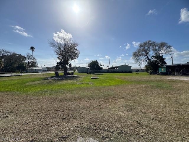 3 City Lots available with sewer connection and water available to tie into, so there's no need for a septic!   Come join the quiet life in Moore Haven.  You'll love the location that is just a block away from US highway 27 with small shopping stores, schools, County Government, City Hall and Sheriffs Dept.  Zoning for manufactured home, single-family, or modular!  There are not many lots left in the city so don't wait, call today!