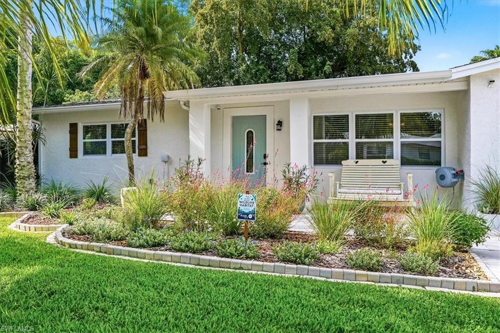 Thoughtfully restored and full of character, this beautifully renovated cottage offers a rare blend of timeless charm, modern updates, and inviting outdoor living just minutes from downtown Naples and the beach. Set on an oversized lot, the home has been extensively renovated, with significant improvements including a new roof, updated electrical system and panel, renovated kitchen and bath, new tile flooring throughout, and updated appliances- all while preserving the home's original charm.

Inside, warm finishes, abundant natural light, and thoughtfully designed living spaces create a home that feels welcoming from the moment you step inside. The sunroom and screened porch invite slow mornings with a cup of coffee, afternoons spent reading, or evenings gathered with friends.

Out back, the oversized yard is every bit as special as the home itself. A thoughtfully curated landscape of Certified Florida-Friendly and native plantings attracts butterflies, birds, and pollinators, while the garden, fire pit, and mature trees create an outdoor setting that feels both peaceful and connected to nature. A detached outbuilding with existing water and electric hookups offers flexibility for a workshop, hobby space, gardening storage, or the opportunity to restore it as additional living space.  

Located just minutes from downtown Naples, Gulf beaches, Baker Park, the Gordon River Greenway, shopping, dining, and everyday conveniences, this is the kind of home that's becoming increasingly difficult to find.