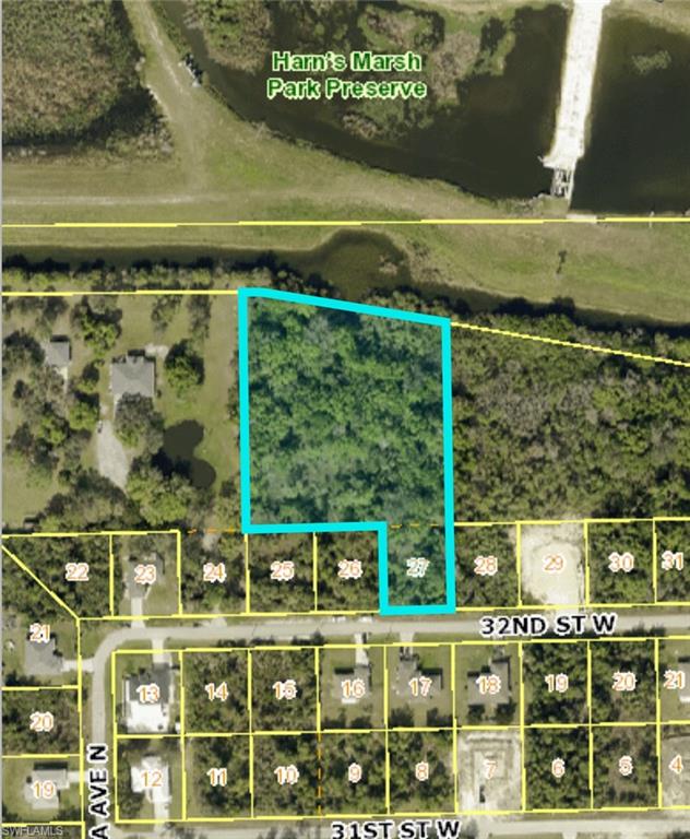 This unique opportunity to acquire this 2.53-acre piece of land in an exclusive, centrally located area of Lehigh Acres. The land is cleared for your next project. It backs up to Hans Marsh Preserve, offering serenity and privacy, close to schools, and steps from Sunshine Blvd, easy access to Fort Myers. Don't miss this opportunity to purchase this gem of a piece of land.
