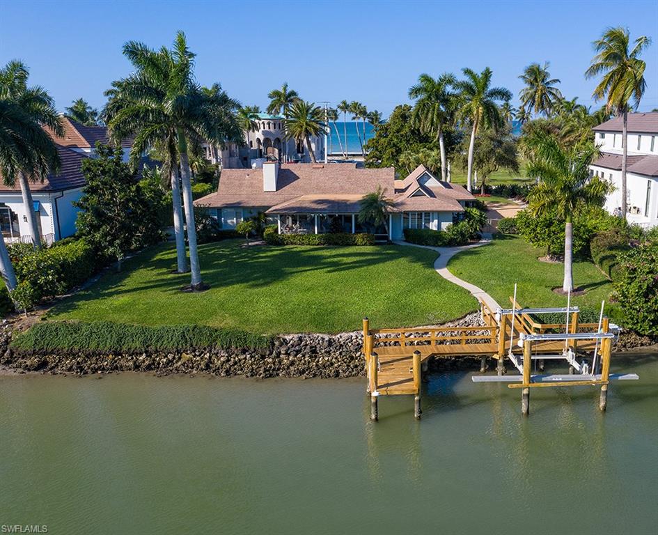 Perfect location for the yachtsman and for those who wish to have quick access to the quiet, sugar sand beaches of South Gordon Drive. Older home being sold in its "As-Is" condition. Port Royal Club and Cutlass Cove Beach Club membership eligibility.