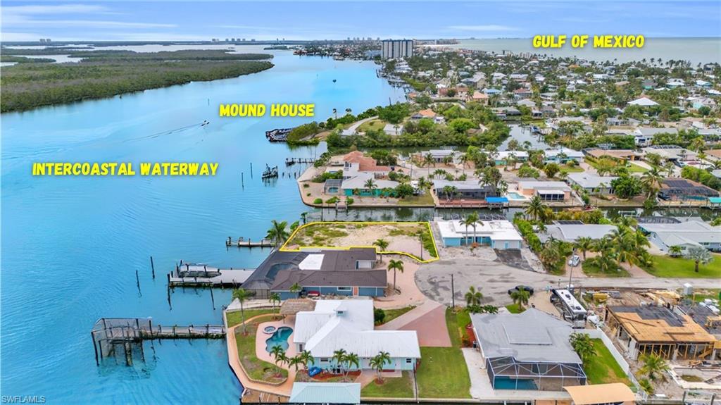 One or more photo(s) has been virtually staged, AI generated or rendered.  BOATER’S BAYFRONT PARADISE | BUILD YOUR WATERFRONT LEGACY Discover one of Fort Myers Beach’s most exceptional waterfront opportunities. Situated on an oversized .23-acre (10,106± sq. ft.) homesite, this rare Bayfront & Canal Front property offers panoramic Intracoastal Waterway views, Gulf access, and the flexibility of dual dock placements along the wraparound canal and bay frontage. Unlike many waterfront lots, this property offers the opportunity to build on roughly 5,780 sq. ft. buildable footprint after setbacks, creating the potential for an extraordinary custom estate with expansive indoor and outdoor living spaces designed to capture breathtaking bay views. Preliminary builder concepts envision a grand luxury residence with soaring ceilings, dramatic walls of glass, elevated construction, and spectacular waterfront entertaining areas.   Imagine sunrise coffee overlooking the bay, afternoons cruising to the Gulf, and evenings entertaining family and friends while watching boats pass by from your own backyard. Boaters will appreciate the direct Gulf access and an unbeatable location just 5 minutes by boat to the Fort Myers Beach Pier District, where waterfront restaurants, marinas, shopping, nightlife, and entertainment await. Walk or bike to the sugar-white sand beaches, enjoy world-class fishing, island hopping, paddleboarding, waterfront dining, and everything that makes Fort Myers Beach one of Southwest Florida’s most desirable waterfront destinations. Whether your vision is a modern coastal masterpiece, an elegant island retreat, or an iconic legacy estate, 470 Madison Court offers one of the most exciting waterfront building opportunities available on Fort Myers Beach. Whether your vision is a modern coastal masterpiece, an elegant island retreat, or an iconic legacy estate, 470 Madison Court offers one of the most exciting waterfront building opportunities available on Fort Myers Beach.