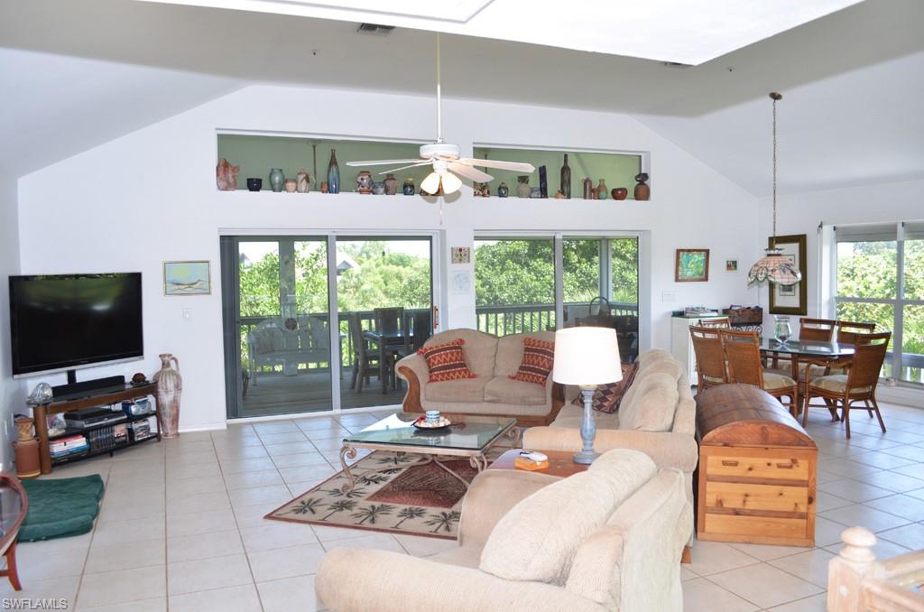 Recently reduce price makes this one of the best homes available on the island. Just steps from the beach, nestled in sea grape trees and cabbage palms, surrounded by nature. The upside-down floor plan makes for cooler sleeping at night and more breezes during the day. There are screened porches off the master bedroom and the second bedroom which provides for a greater sense of spaciousness. The open deck off the third bedroom can be used as a private entry for guests. The second level has an open floor plan comprised of the living room, dining area, kitchen and half bath, great for a comfortable lifestyle and entertaining. Second floor also has a screened porch off the living area and an open deck off the kitchen; one can follow the sun or hide from the sun. The tower has a spectacular view of the island and gulf. Seller is the original owner, and the home has not in a rental program with the benefits associated with those characteristics. For more privacy the lot south of the home is available for additional consideration. The Safety Harbor Club membership is not included but available with a number of major benefits including dockage, pool, club house, tennis, trash collection and the availability of a maintenance staff. 
Please ask for further information concerning memebership application, transfer fees and dues.