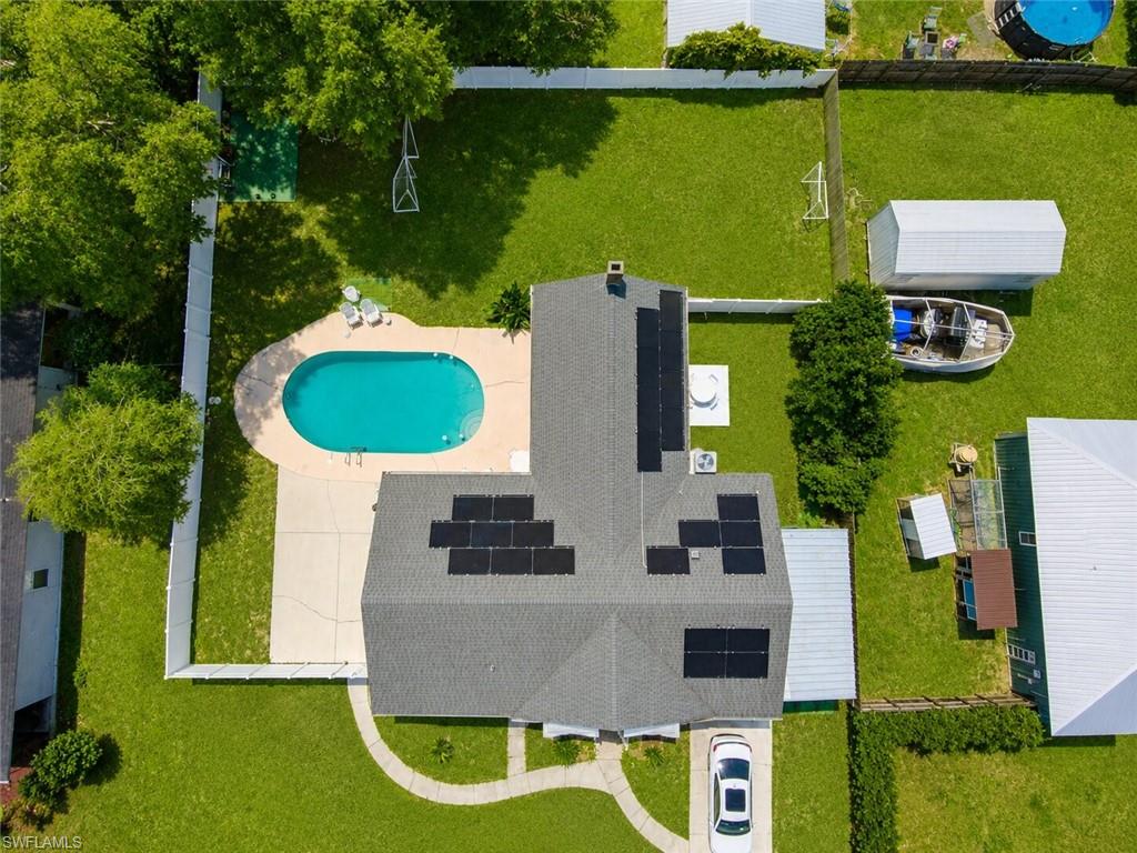 One or more photo(s) has been virtually staged, AI generated or rendered.  One or more photo(s) has been virtually staged, AI generated or rendered. Enjoy Florida living in this inviting 3-bedroom + Den, 2-bath home featuring a sparkling private pool, large fenced backyard, and covered parking. Nestled in the charming lake community of Keystone Heights, this property is conveniently located within walking distance to Keystone Beach, parks, and downtown amenities. Residents appreciate the area's peaceful atmosphere, scenic lakes, and easy commute to Gainesville, Jacksonville and the historic St Agustine. With plenty of outdoor space and a prime location, this home offers the perfect combination of comfort and convenience.