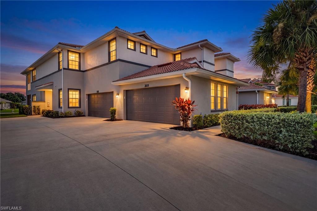 Step into this recently constructed carriage home and you will be awed by its massive size and abundant natural light. With voluminous ceiling heights and large rooms, you will find the space to be inviting and perfect for either year-round or part-time living. It's being offered turn-key, meaning you can begin living your best Florida life on the day you close. The kitchen is large and features a stainless steel appliance suite, large island with seating for five and a large walk-in pantry. The living area overlooks the double sliding impact doors and is large enough to accommodate oversized furnishings. The owners suite is spacious with a large walk-in closet and spa-like ensuite. A family room/den is perfect for entertaining or separate television watching area. Step out onto your screened lanai and enjoy gorgeous water views and views of Gateway Green's hole number 6. Just steps out of your door is the community pool and fitness center which only serves the 64 units of Santa Luz.  Gateway residents also have access to the Gateway community pool, play ground and dog park. Social and golf memberships are available for purchase at The Club at Gateway where you can enjoy an amazing restaurant, spa, gym tennis and pickleball courts and golf facilities.