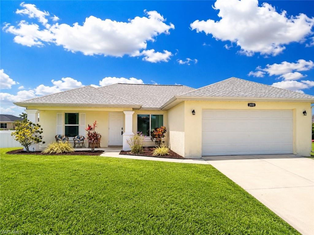 This immaculate home is perfect as a starter, retirement or vacation home. t is a Split bedroom floor plan, giving privacy to master bedroom suite from other 2 secondary bedrooms and bathroom. Home has southern exposure
with screened lanai off the living room. Brand new Frigidaire smudge proof stove, refrigerator, dishwasher and Microwave. 4 year old roof and 3 year old windows. Laminate flooring and ceramic tile throughout. Maintenance free inside and out. Quite neighborhood. Home has been used very little and is in great shape. A must see.