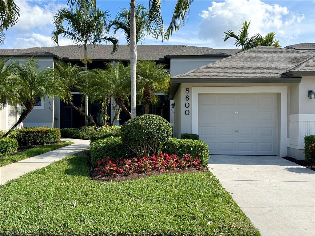 Hard-to-find FIRST-FLOOR 2BR + DEN / 2BA Veranda with GARAGE in Naples Heritage—GOLF MEMBERSHIP INCLUDED!
Enjoy the convenience of ground-floor living with no stairs to climb in this highly sought-after Veranda floor plan. This rare 2-bedroom plus den residence offers EXCEPTIONAL VALUE and an outstanding opportunity to own in one of Naples' premier bundled golf communities.
Ideally located within walking distance of the clubhouse and just steps from a satellite pool, this residence also offers convenient guest parking nearby. Offered turnkey furnished, the condo features new IMPACT-RESISTANT WINDOWS AND SLIDERS for added peace of mind and energy efficiency.
Start your mornings on the front screened lanai with tile flooring and tranquil garden views, then unwind in the evening on the rear screened lanai overlooking the golf course—also tiled and perfect for relaxing or entertaining guests.
Inside, the bright and inviting eat-in kitchen features a double pantry and ample storage. The open-concept living and dining areas create a comfortable space for everyday living and entertaining. The spacious primary suite includes two walk-in closets and a private ensuite bath. A split-bedroom layout provides privacy for guests, while the den offers flexible space ideal for a home office, media room, or occasional third bedroom. The separate laundry room is equipped with a new washer and dryer.
Residents enjoy the added convenience of a satellite pool just steps from the building, along with all the exceptional amenities Naples Heritage has to offer.
Located within the beautifully landscaped, gated community of Naples Heritage Golf & Country Club, homeowners enjoy an 18-hole championship golf course, driving range, putting green, renovated clubhouse with pro shop, resort-style pool with cabana and bar, fitness center with on-site instructors, tennis, pickleball, bocce, scenic walking and biking trails, and multiple dining venues.
All of this is conveniently located just minutes from downtown Naples, Fifth Avenue South, I-75, Marco Island, and the area's world-renowned Gulf beaches.