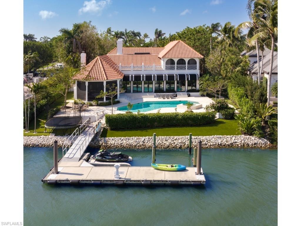 Breathtaking views over Treasure Cove from this architectural masterpiece in Port Royal. Thoughtfully designed by renowned architect Kasimir Korybut, the residence embodies elegance while maintaining the comfort and feel of tropical living. Significant improvements have been made to enhance the structure and livability of this 5 bedroom residence. The aesthetically pleasing, yet exceptionally functional home accommodates formal gatherings and casual entertaining with equal ease. One of the most dramatic views in all of Port Royal! Port Royal Club membership eligibility.