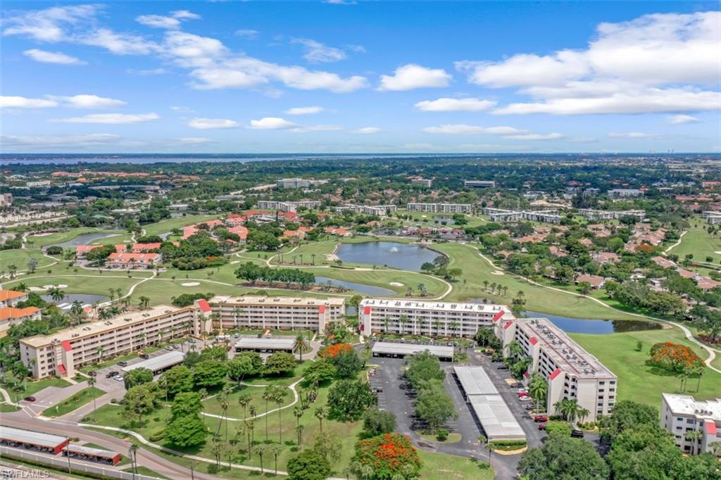 IN DEMAND Seven Lakes End Unit Now Available! 
This bright 5th-floor condo has spectacular golf course views & an assigned carport space directly across from the elevator. Two bedrooms & 2 full bathrooms, a panoramic outdoor view from the kitchen, and an open concept living/dining space with all new impact windows. Add your personal touch and be at ease with a newer AC unit & water heater, plus a washer & dryer in your unit. Most necessary expenses (water/sewer, cable, internet, trash removal, outdoor & building maintenance, and flood insurance) are included with the association fee.
Enjoy this 55+, gated PRIVATE GOLF COMMUNITY with 6 HEATED POOLS, a fitness center, 6 TENNIS COURTS, library, onsite restaurant, billiards, shuffleboard and bocce ball. NO Transfer fees and NO Green Fees. Don’t delay; this corner unit will move fast.