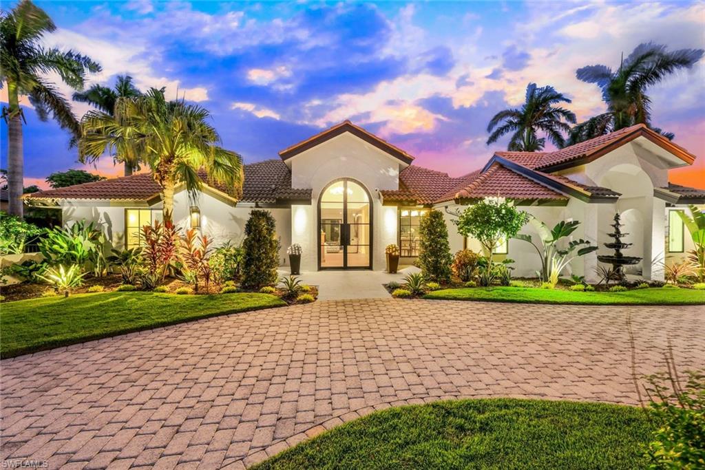 LIVE THE DREAM in this stunning, fully remodeled CUSTOM home in iconic Park Shore! The interior has been completely REDESIGNED to an open concept layout with exquisite raised ceilings and HIGH-END FINISHES. Every detail has been METICULOUSLY CRAFTED, from beautifully renovated kitchen and baths with Quartzite and marble countertops to wide-plank hardwood flooring and new LED lighting throughout. The gourmet kitchen makes entertaining a breeze with all NEW APPLIANCES that include a commercial quality dual fuel range, Thermador built-in refrigerator, and 30” wine refrigerator. Your OUTDOOR RETREAT offers the ultimate in privacy with new lush landscaping surrounding the spacious pool area that boasts elegant SHELL STONE TILES. The Aqualink Pool control system ensures that your pool is always ready for a refreshing dip! NO hurricane damage due to NEW Anderson and PGT IMPACT DOORS AND WINDOWS and certified 10 ft elevation. The home is situated on a desirable corner lot and homeowners have access to the prestigious Park Shore beach club. Just minutes from Venetian Village, Waterside Shops, and downtown Fifth Avenue with its upscale shops and restaurants, this gem is a must-see!