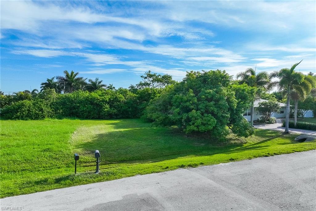 Build your vision in the heart of Naples Park. On the desirable 500 block, X500 flood zone, just one-half mile to the beach, this residential homesite presents an exceptional opportunity to create a new residence or investment property in one of Naples sought-after communities. The lot has been partially cleared while retaining select mature trees, offering a head start for future development. Naples Park is known for its flexibility and convenience, with no homeowners association fees and no pet restrictions. Ideally just minutes from Gulf of America beaches, Mercato, Wiggins Pass State Park, dining, shopping and everyday conveniences, this location offers easy access to some of Naples celebrated coastal and lifestyle destinations. Whether planning a full-time residence, seasonal retreat or investment opportunity, this property provides the ideal setting to bring your plans to life.