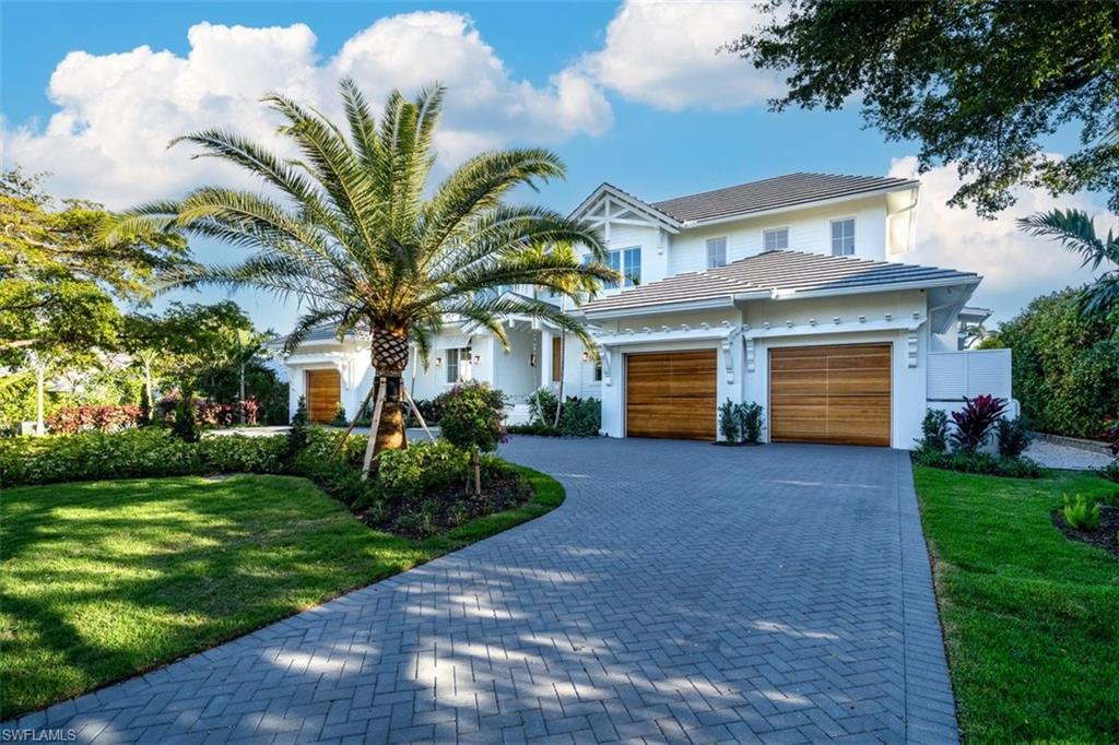 With preferred southern exposure and comfortably situated in the quaint waterfront neighborhood of Aqualane shores is this new construction home at 508 16th Avenue South. Thoughtfully designed by MHK Architects and constructed by Source Construction and Development. Featuring 5 bedrooms and 7 baths, with 5,593 square feet of living space and over 7,000 total square feet of luxury living! Recently completed in early 2026 this home also features a 48 kilowatt full house generator to power all your needs in case of a power interruption. A very short stroll to the dining, shopping and lifestyle hub of third street south, as well as 5 short blocks to the sugar sand of our Naples beaches!
