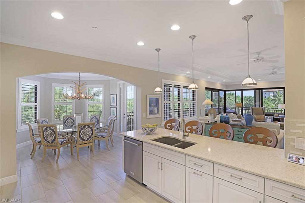 Cielo at the Colony Golf & Bay Club offers one of the most desired condominium floor plans created.  Captivating you the moment you step off the private elevator.  A commodious great room with zero edge sliders seamlessly merges the expansive loggia. Enjoy panoramic views of the fountained lake, pool, & lush landscape.  
The coastal contemporary designed home is uniquely situated on a cul de sac providing privacy & sunny SE exposure. Boasting over 2900 sq ft of living to include 3 ensuites, powder room, & a study with private balcony. 
A generous gourmet kitchen with natural gas, 12 x 24 running bond tile, quartz countertops, & wine bar with dual coolers are a few of many enhancements to appreciate.  Custom closets to maximize storage. Impact resistant windows & doors in addition to electric storm screen roll downs on the loggias. 

A highly amenitized gated community, a private Island Beach Park, Waterfront Restaurant, Kayaking, Fitness Center, Tennis, Pickleball, in addition to optional golf memberships. Located within minutes to over 144 retail shops, restaurants, & the International Airport. Envision a lifestyle of endless opportunities in a most preferred SWFL location.