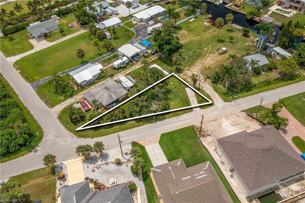 Great lot with no HOA!! Perfect for your tiny home! In fact, there was previously a tiny home on this adorable corner lot in a great neighborhood in South Fort Myers! Close to beaches, airport, shopping, dining, schools, and entertainment! Great value! Seller also has 2 adjacent parcels available - MLS # 223061465 & #23061469 - fantastic opportunity for a package deal of just under 3/4 of an acre of waterfront property in South Ft. Myers minutes to the Gulf of Mexico!