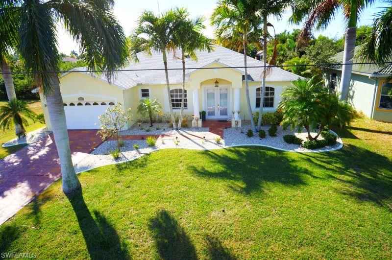 Exquisitely decorated 4 bedroom, 3 bath home with a den, pool and boat dock on a canal with gulf access and no bridges. This home has all of the character and luxuries you desire to enjoy. The master suite has a beautifully tiled bathroom. You will wake up to a view of the exceptionally stunning pool. The 1st guest room has a sliding door with private access to the patio and pool. Across the hall is a pool bath with a tub and shower. Bedroom 3 and 4 share a  full bathroom. The completely equipped kitchen enjoys a granite island. It opens to the great room which has a fireplace, and access to the pool. With the southern exposure you will be able to take pleasure in many beautiful sunsets. The swimming pool was resurfaced in November 2014, new kitchen and appliances in 2013. This house has an excellent rental history!

ATTENTION: SELLER IS VERY MOTIVATED - BRING YOUR OFFERS !!!