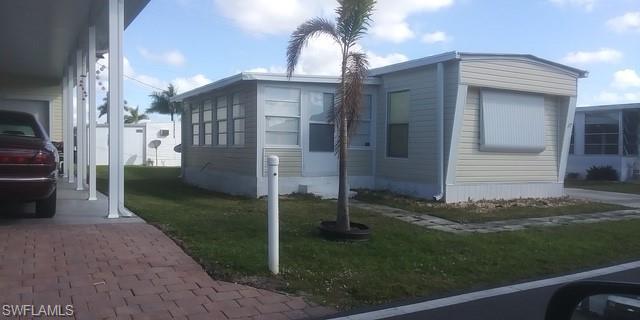 Welcome to your slice of paradise in the heart of Naples. This well-maintained 3 bedroom, 1.5 bathroom mobile home is nestled in the peaceful and friendly Hitching Post Mobile Home Park, offering both comfort and convenience just minutes from the area’s top beaches, shopping, dining, and entertainment.
Step inside to find a bright and open floor plan designed for easy living. The living area flows seamlessly into the kitchen and dining spaces, creating a warm and inviting atmosphere perfect for both relaxing and entertaining. The kitchen features plenty of cabinet space and functional design.
The primary bedroom includes direct access to the full bathroom, while two additional bedrooms offer flexible space for guests, a home office, or hobby room. The convenient half bath adds extra functionality for visitors or daily use.
Enjoy Florida’s outdoor lifestyle on the spacious open lanai—ideal for morning coffee or unwinding in the evening. A 1-car covered carport provides shade and shelter, with direct access to the home for added convenience.
Located in the welcoming 55+ community of Hitching Post Mobile Home Park, this home is perfect for seasonal residents or full-time Floridians looking to enjoy a relaxed, coastal lifestyle.