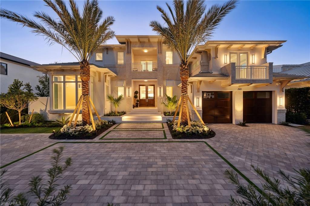 Special and rare.  This is a once in a lifetime opportunity to own a new construction home with --stunning western views --no bridge access to the Gulf--a long water setting on Aqua Cove--steps to the beach--and steps to the shops and restaurants of 3rd St S.  As you walk through the oversized Mahogany front doors your attention is immediately taken through the home, over the zero-edge spa and acrylic pool wall, and out onto the beauty of the water beyond.  Large walls of glass effortlessly slide away to provide seamless access to the outdoor spaces, and the well-appointed lanai with an elegant fireplace, bar/grill area, full pool bath, firepit with built-in seating, and electric rolldown screens allow for long poolside afternoons.  Worthy of such a setting, this home provides everything an owner could hope for:  Lutron Lighting automation in every room, a full Service Kitchen, whole home generator, 1000 gallon propane tank, steam room shower, heated tile flooring in the Primary bathroom, automated and embedded shades in Primary Suite and Office, Andersen Liftslide doors, private elevator, two laundry rooms, and an ultra-luxurious VIP suite on the second floor.  This is how Naples was meant to be experienced.