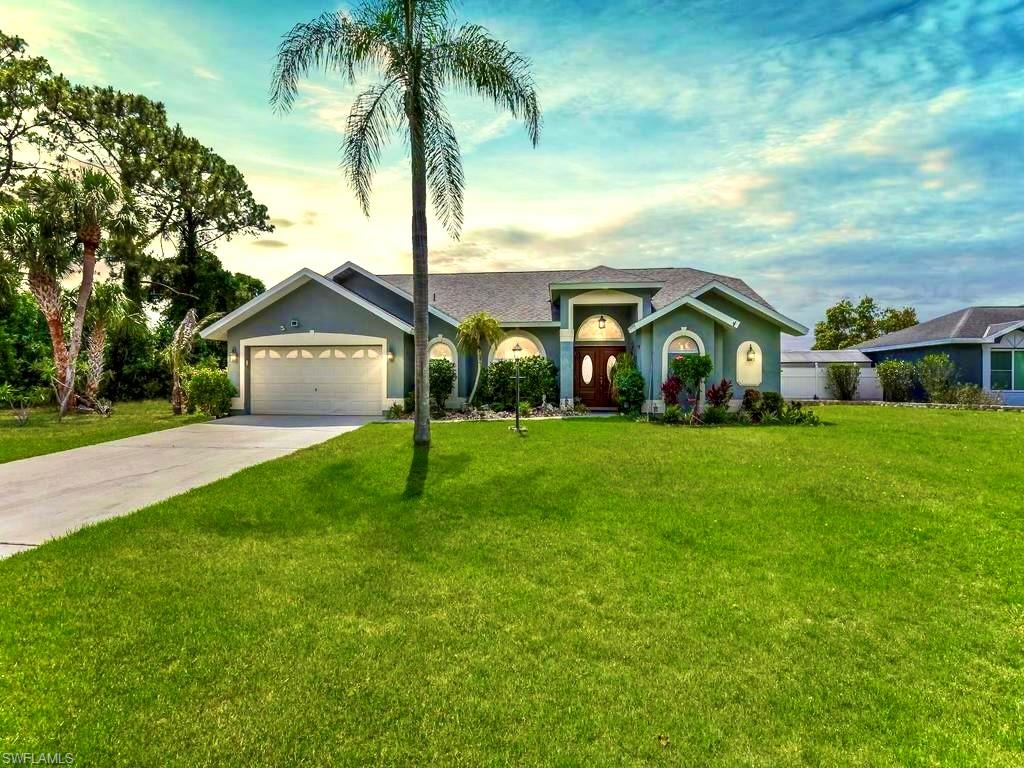 MOTIVATED SELLER!!! Welcome to the meticulously maintained over 2,300 sq ft 4/2 electric HEATED waterfall POOL home with CITY water & sewer nestled away in the highly desirable Covington meadows with NO HOA fees. This 6ft FENCED peaceful property with Serene Koi pond at entrance has been professionally landscaped Boosting GRAND elevations with DOUBLE door entrance plus vaulted & cathedral ceilings as well as refreshing big bay windows spotlights new IMPACT WINDOWS & DOORS, favorable plantation shutters, a spacious front foyer, a desirable soaking tub, and a recently remodeled QUARTZ countertop & Vessel sink in pool Bath. It has been freshly painted and highlights newer STAINLESS STEEL appliances with induction range, a welcoming breakfast far with Illuminated cabinetry & tiled backsplash, new LUXURY vinyl flooring, an electric fireplace, (2020) Dimensional shingle roof, NEWER hvac, NEW pool pump & pool heater with warranty, and (2025) water heater. It also highlights recessed & pendant lighting PREMIUM fixtures, dual WALK-IN closets, an awarding dual sink vanity and framed glass tiled shower, an attractive electric fireplace, HIGH SPEED internet, upgraded commode, irrigation system, storage shed with pad and side gate access, laundry under air with High efficiency washer & dryer + Storage cabinets, and an impressive covered back patio great for entertaining. It is NOT in a flood zone just minutes to all major amenities and a quick commute to Fort Myers. Fully furnished negotiable. Schedule your private showing today!