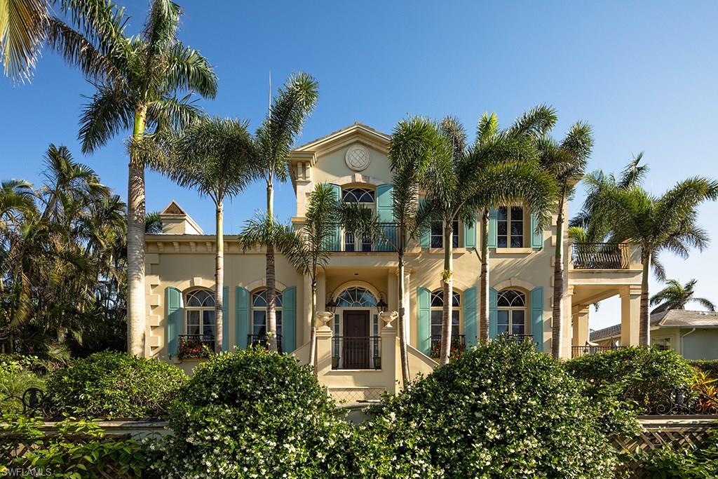 40 5th Avenue South is an elegant residence located on prestigious 5th Avenue South in Old Naples. Upon arrival, guests are greeted in a two-story grand foyer with a sweeping spiral staircase. The formal living and dining rooms and family room each offer intimate retreats which are the ultimate venues for engaging conversations with family and friends. The open kitchen and adjacent living area were designed to facilitate the ultimate culinary experience. The large master suite is located on the first living level, while 3 guest bedrooms, one of which is a 3-room suite, are located on the second level of the home. Also, located on the second level is a most impressive entertainment parlor with a bar, featuring detailed millwork and an adjacent office with rich wood accents. Outdoor terraces strategically located alongside the key interior rooms, function as seamless extensions of the interior spaces and offer access to the inviting pool deck located on the southwest corner of the home. This residence, located just one home off the beach and only steps to the excitement of the shops and dining of 5th Avenue South is a rare opportunity to enjoy the quintessential Naples experience.