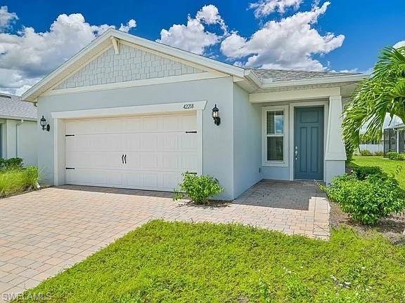 This beautifully appointed home at 42218 Edgewater Dr offers the perfect blend of comfort, convenience, and modern living in the highly sought-after gated community of Edgewater at Babcock Ranch.  
This 2-bedroom, 2-bath plus den single-family residence is located just a short stroll from Founders Square and the town center.
The upgraded kitchen is a chef’s dream, featuring stainless steel appliances with a gas range, soft-close cabinetry, granite countertops, a stylish tile backsplash, and a center island with breakfast bar seating. The spacious primary suite includes a generous walk-in closet and a private bath with dual sinks, while both bathrooms showcase upgraded tile and walk-in showers.
Energy-efficient enhancements include a gas water heater, washer and dryer, and storm shutters—adding peace of mind and everyday practicality.
Residents of Edgewater enjoy access to a private resort-style pool and cabana, barbecue grills, and a cozy fire pit—ideal for relaxing or entertaining. Founders Square and the Lakehouse are just minutes away, offering recreational amenities, food trucks, a lively farmers market, and year-round concerts, community events, and activities for all ages.
As America’s first solar-powered town, Babcock Ranch offers miles of scenic walking and biking trails, playgrounds, community gardens, fishing docks, dog parks, fitness facilities, and over 8,500 acres of preserved greenways, parks, and lakes. The community’s resilient infrastructure includes underground utilities, advanced stormwater systems, and a reliable solar energy network designed for stability during storm season. Dining, shopping, schools, and medical facilities, all right here at Babcock Ranch—making this an exceptional place for the whole family to enjoy.