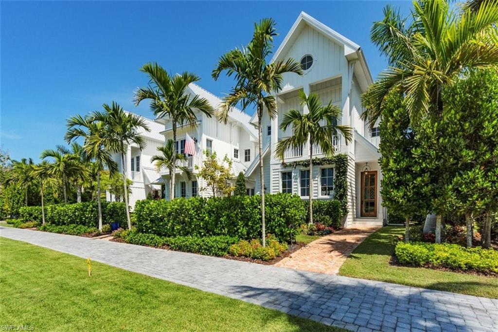 Come discover this stunning coastal chic house in the heart of Old Naples. This 3,600 s.f. home spans two floors and has an open-air roof deck to take in the eastern facing panoramic views. The interior offers generous living and dining space, as well as a gourmet chef’s kitchen, and another first floor den/bedroom all to have you to linger longer. Three bedrooms, a deck overlooking the pool, and a fully equipped laundry room make up the second floor. There is also a private elevator. Designed with your comfort and convenience in mind, no detail has been overlooked in constructing and furnishing this coastal themed residence. From your location in the midst of Olde Naples, the beach, the city docks, local parks and recreational amenities are near by, along with the best in shopping and dining.