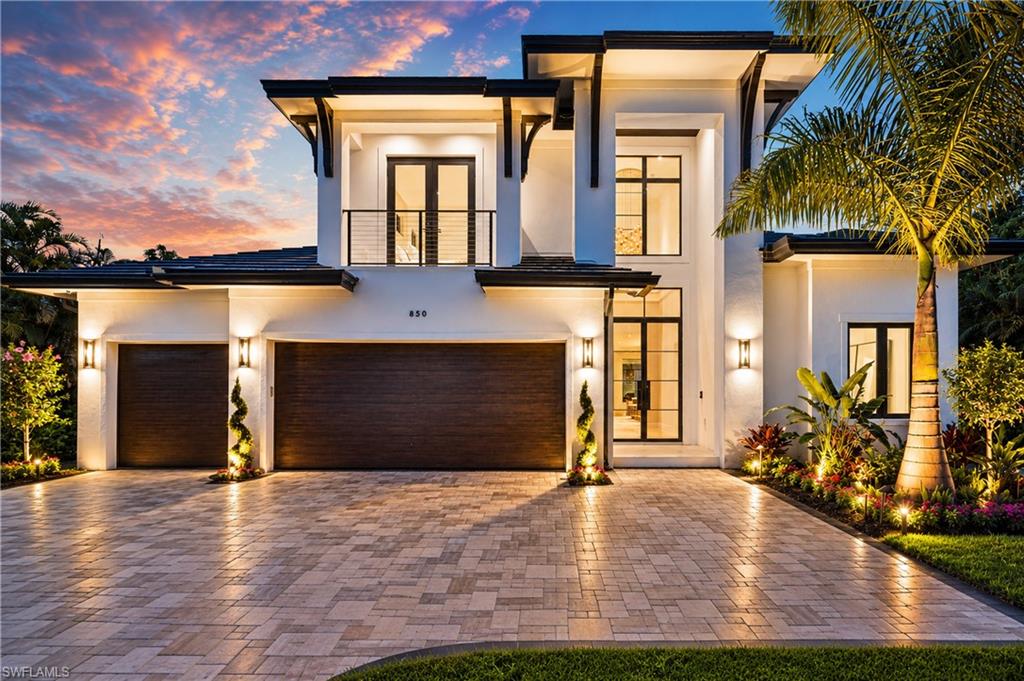 Exceptional value for a brand-new ultra-luxury home in the heart of Naples. Located in the desirable X flood zone, Solterra is just minutes from the beach, Four Seasons Resort, downtown Naples, and the Naples Design District. Built by the renowned Glendale Group of SW Florida, this architectural statement offers 4,466 square feet of meticulously crafted living space with 5 bedrooms and 5.5 bathrooms. Every finish, material, and design element has been carefully selected to deliver a level of quality rarely found at this price point. The chef's kitchen is designed to impress, featuring Sub-Zero, Wolf, and Miele appliances, The Galley workstation sink, Taj Mahal and Cristallo quartzite, custom cabinetry, gas cooking, and an elegant wine bar - creating a spectacular setting for both intimate dinners and grand-scale entertaining. The dramatic great room is anchored by a floor-to-ceiling Ocean Blue quartzite feature wall, a custom vapor fireplace, and walls of glass that bathe the interiors in natural light while seamlessly connecting to the outdoor living spaces. The first-floor primary suite is a private sanctuary with a spa-inspired bath, while an additional en-suite guest bedroom offers the flexibility of a distinguished home office. Upstairs, three private guest suites surround a loft-style lounge and covered lanai, providing exceptional comfort for family and guests. Refined details continue throughout with wide-plank white oak flooring, a custom cast iron entry door, statement lighting, Lutron RA3 lighting controls, multi-room Bluesound audio, a whole-house generator, propane gas system, and a comprehensive security system. The outdoor living experience is equally impressive, featuring a resort-style pool and spa, summer kitchen, outdoor shower, motorized hurricane shutters, and retractable insect screens, creating an exceptional setting for year-round enjoyment. Perfectly positioned in Lake Park, one of Naples' most established and desirable neighborhoods, Solterra offers the rare combination of walkability, no HOA restrictions, and immediate access to the city's finest dining, shopping, galleries, and white-sand beaches. The Four Seasons Resort and the Gulf are just four minutes away, while the Naples Design District, Lake Park Diner, and River Park are all within walking distance. Solterra delivers a caliber of design, craftsmanship, and architectural presence typically associated with homes at a far higher price point. Built to stand the test of time, Solterra is a home defined by exceptional design, enduring craftsmanship, and timeless appeal.