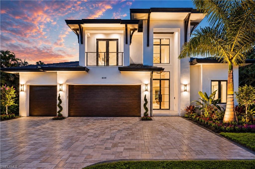 Exceptional value for a brand-new ultra-luxury home in the heart of Naples. Located in the desirable X flood zone, Solterra is just minutes from the beach, Four Seasons Resort, downtown Naples, and the Naples Design District. Built by the renowned Glendale Group of SW Florida, this architectural statement offers 4,466 square feet of meticulously crafted living space with 5 bedrooms and 5.5 bathrooms. Every finish, material, and design element has been carefully selected to deliver a level of quality rarely found at this price point. The chef's kitchen is designed to impress, featuring Sub-Zero, Wolf, and Miele appliances, The Galley workstation sink, Taj Mahal and Cristallo quartzite, custom cabinetry, gas cooking, and an elegant wine bar - creating a spectacular setting for both intimate dinners and grand-scale entertaining. The dramatic great room is anchored by a floor-to-ceiling Ocean Blue quartzite feature wall, a custom vapor fireplace, and walls of glass that bathe the interiors in natural light while seamlessly connecting to the outdoor living spaces. The first-floor primary suite is a private sanctuary with a spa-inspired bath, while an additional en-suite guest bedroom offers the flexibility of a distinguished home office. Upstairs, three private guest suites surround a loft-style lounge and covered lanai, providing exceptional comfort for family and guests. Refined details continue throughout with wide-plank white oak flooring, a custom cast iron entry door, statement lighting, Lutron RA3 lighting controls, multi-room Bluesound audio, a whole-house generator, propane gas system, and a comprehensive security system. The outdoor living experience is equally impressive, featuring a resort-style pool and spa, summer kitchen, outdoor shower, motorized hurricane shutters, and retractable insect screens, creating an exceptional setting for year-round enjoyment. Perfectly positioned in Lake Park, one of Naples' most established and desirable neighborhoods, Solterra offers the rare combination of walkability, no HOA restrictions, and immediate access to the city's finest dining, shopping, galleries, and white-sand beaches. The Four Seasons Resort and the Gulf are just four minutes away, while the Naples Design District, Lake Park Diner, and River Park are all within walking distance. Solterra delivers a caliber of design, craftsmanship, and architectural presence typically associated with homes at a far higher price point. Built to stand the test of time, Solterra is a home defined by exceptional design, enduring craftsmanship, and timeless appeal.