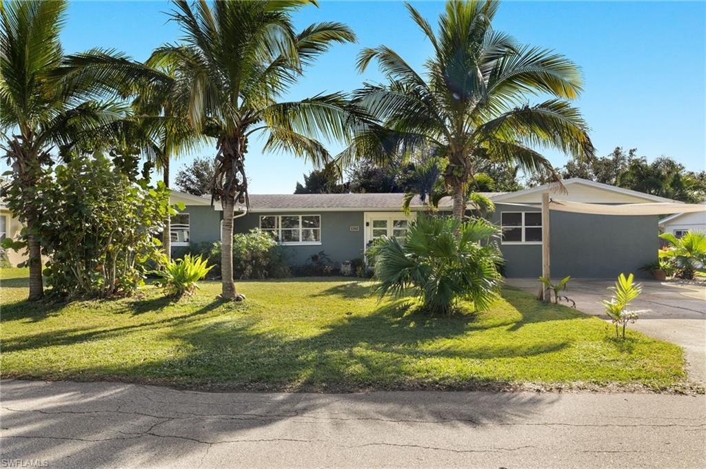Nestled in the highly desirable Riverside McGregor neighborhood, this exceptional home offers the perfect blend of style, comfort, and Florida outdoor living. This is your opportunity to own a truly special property in a great neighborhood. Designed with both everyday living and entertaining in mind, this beautifully updated residence features three spacious bedrooms, two tastefully renovated bathrooms, and a half bath accessible from the pool or home. Thoughtful upgrades can be found throughout the home, including elegant custom glass closet doors, designer tile finishes, and high-quality craftsmanship that create a polished, move-in-ready feel. The open-concept kitchen flows seamlessly into the living and dining areas, creating a welcoming space for gathering with friends. A separate family-room on the opposite side of the kitchen provides additional flexibility—ideal for movie nights,or simply giving everyone room to spread out. Large glass doors from both living spaces open to an extraordinary backyard retreat. The private, fenced outdoor oasis is centered around a sparkling oversized swimming pool and is designed for year-round enjoyment. Two covered outdoor living areas provide the perfect settings for relaxing or entertaining—one arranged as a comfortable lounge with space for outdoor television viewing, and the other ideal for al fresco dining. The pool equipment is thoughtfully protected inside a dedicated storage shed, helping extend the life of the system while keeping the backyard neat and organized. Beyond the pool and entertaining spaces, the expansive landscaped yard offers plenty of room for  pets to roam, or gardeners to create their own private paradise. When you're ready to explore, leave the car behind and hop on your golf cart to enjoy the area's popular restaurants, shopping, and the scenic beauty that has made the McGregor corridor one of Fort Myers' most sought-after locations. This is more than just a home—it's a lifestyle where comfort, convenience, and exceptional outdoor living come together in one remarkable property.