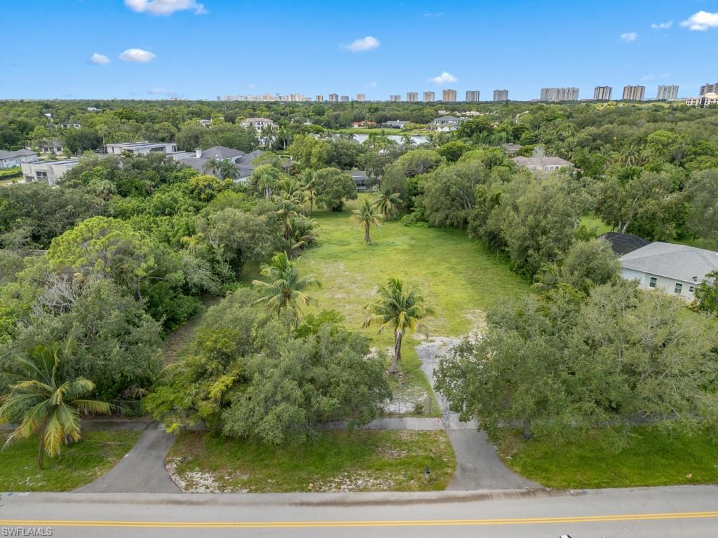 Discover this exceptional opportunity to build your dream home on 1.22 acres located on one of the most desirable streets in the coveted North end of Pine Ridge Estates. With preferred southern exposure, the premium dry parcel offers privacy and convenience in an unbeatable location, presenting the perfect canvas on which to create your custom estate. Situated just around the corner from Mercato and only minutes from Waterside Shops and Vanderbilt Beach, you’ll enjoy direct access to Naples’ most premier luxury lifestyle destinations. Preliminary design plans crafted by Stoft Cooney Architects are also available. Don’t miss this rare chance to build your private enclave in a prestigious location with proximity to everything Naples has to offer!