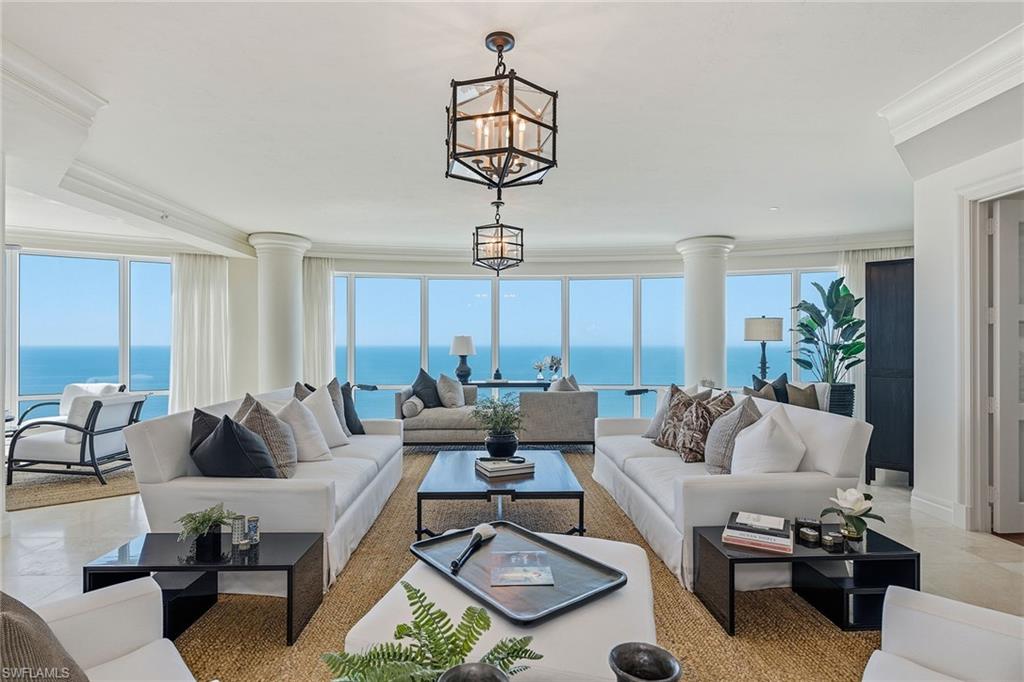 Enter this stunningly crafted beachfront residence from your private entry foyer to reveal endless views of the sparkling blue waters of the Gulf. Behind the gates of the prestigious and opulent Regent condominium building. Encompassing over 8,250 square feet, designed to meet the discerning taste of quality living and elegance while spanning an entire half of the 17th floor of the Regent. Features include the finest of artisan marble and wood flooring, custom cabinetry and millwork, custom draperies, elegant seating areas, spacious grand salon and custom multi-tiered six-seat media theater, private office and library, magnificent chef's kitchen with state-of-the-art appliances including gas cooktop and Sub-Zero refrigeration. The primary suite is a masterpiece of luxury with dual baths, custom closets and office. Car enthusiasts will appreciate the three-car parking spaces. The Regent offers unmatched amenities with professionally staffed 24-hour front desk, boardroom, social room, fitness, guest suites, pool and spa. Experience and unrivaled Naples beachfront lifestyle with close access to Park Shore boutique shops and some of the best restaurants in Naples.