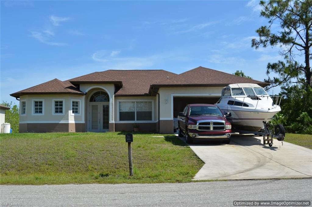 BEAUTIFUL RENOVATED HOME!!!! Home features 3 bedrooms 2 1/2 baths, tile floors in main living area, wood laminate in bedrooms, high volume ceilings!!!! Kitchen features center island with vegetable sink, stainless appliances, granite counters, tiled back splash. Master Suite features LARGE bedroom with sitting area-- Master Bath has separate garden soaking tub with wrap around shower!!!! Nice under truss screened lanai with additional open brick paver patio. Home is located off Bell Blvd on dead end street--- QUIET and little traffic. Great home at a great price. SEE THIS HOME TODAY!!!!