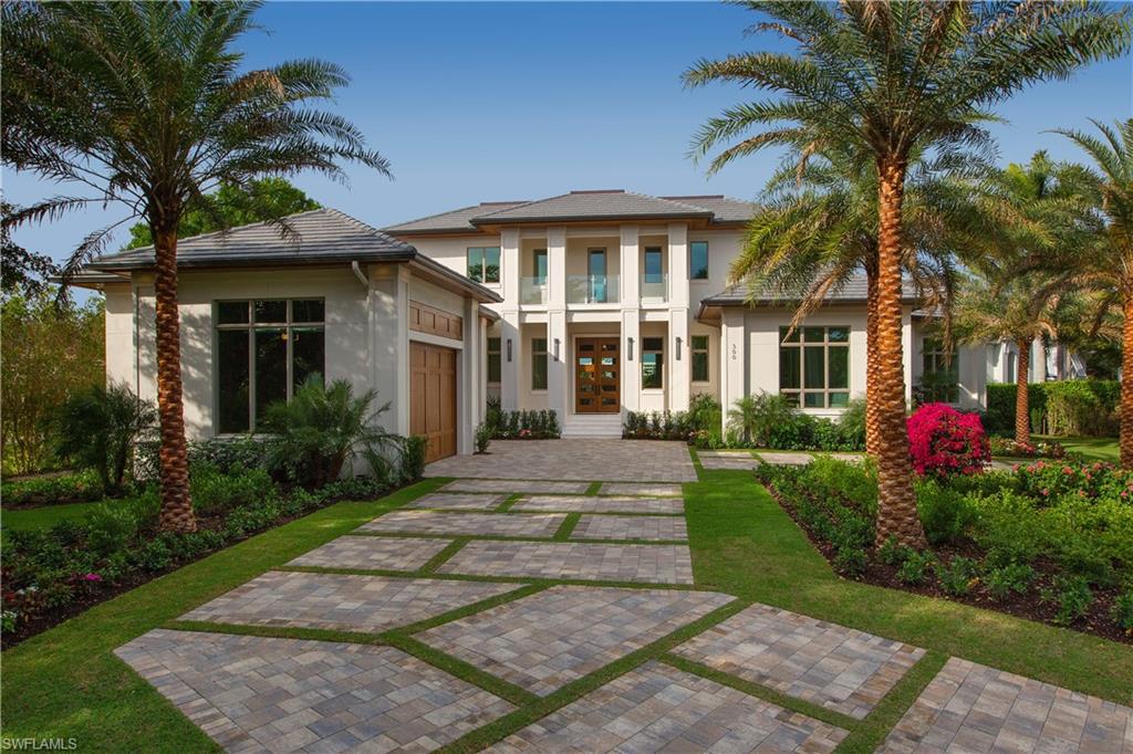 Waterfront living at its finest, this property has glistening views of Venetian Bay. This grand masterpiece has lush landscaping all built by Knauf-Koenig. Enjoy your expansive infinity pool with a sun shelf and spa while having a perfect view of sunsets over the water. Exceptional outdoor living on your two covered lanais with an outdoor kitchen. As impeccable is the indoor living with 5 bedrooms plus den, 5 bathrooms, and 2 upper balconies. This pristine kitchen offers a wine bar which flows to the open family room. Enjoy quick access to the Gulf with your private dock and boat lift. Prime location on this prestigious street and close to all of Naples’ best amenities at Venetian Village, Waterside Shops, and Park Shore Beaches.