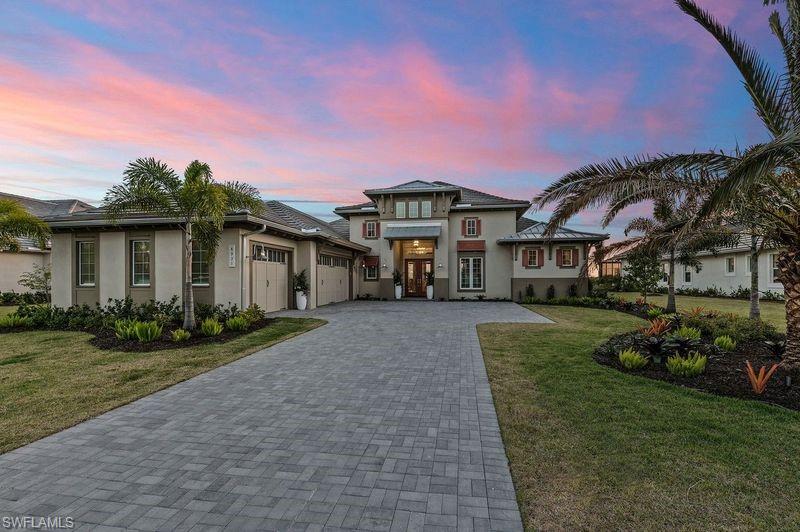 This stunning POOL and SPA home with breathtaking PRESERVE views is truly a showplace and will impress even the pickiest buyers. Perfect for those who like privacy. This preserve is extremely unique, you've never seen anything like this, it's like being on safari. Must see this to truly appreciate it's beauty. Highly coveted Southwest exposure for breathtaking sunsets. Professionally decorated ENTERTAINER'S DREAM home with an open concept floor plan, tons of natural light, chef's dream kitchen & LUXURY OUTDOOR LIVING. Soaring ceilings and enormous light filled glass sliding doors for that airy feel. Large living room with custom built-in shelves and cabinets, fireplace, coffered ceiling, dining area with built-in bar and zero corner glass sliders. Stunning chandeliers throughout. Majestic office/den with custom built-in shelves and cabinets. Your divine and private master suite includes his and hers walk-in closets with custom built-ins, a walk-in shower, gorgeous tub and dual sinks. Master bedroom is located on the side of the home and walks out to the lanai, perfect for your morning coffee. Each guest bedroom has its private bathroom for your guest's comfort. Gourmet chef's kitchen with lots of cabinets, huge island, breakfast bar, walk-in pantry, gorgeous backsplash and gas stove. The amount of covered and uncovered outdoor space is unreal, allowing you to enjoy being outside all year round. Outdoor area will impress you with large outdoor kitchen. Saltwater pool and spa with waterfalls overlooking vast preserve. This majestic home with UPGRADES GALORE was decorated by professional designer with no expenses spared. Furniture and decorations are negotiable. Low HOA dues with luxury amenities, pickleball, tennis, resort style pools and fitness. Just minutes to Old Naples, famous 5th Ave, world class beaches and Hamilton Harbor Yacht Club.