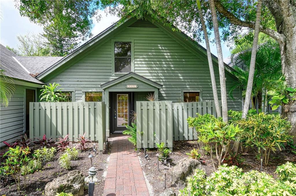 One or more photo(s) has been virtually staged, AI generated or rendered.  Hidden Gem Bent Pine Villa surrounded by serene nature among flora and fauna with exceptional space. This three bedroom PLUS Den has been recently painted inside and steam cleaned to welcome new owners. The HOA has replaced the roofs and skylights in 2021 and will be painting the exterior soon. An enchanting walkway leads one up the meandering path to the villa and just beyond is a community lawn with Lake May Lou views. Bent Pine Villas is located just east of 41 and Park Shore and west of Goodlette Frank, yet pleasantly serene. So close to everything convenient and the beach, yet one feels like they are miles away. The vaulted ceilings give a spacious feel, with all new fans with lights. The photography has been virtually staged to show how this villa can be furnished and enjoyed. Bent Pine Villas is a low density neighborhood in the heart of Naples with a community pool lakeside. PET FRIENDLY! A rare cobblestone pathway leads to the front door. Newer dishwasher, oven and newer HVAC. This is a well designed villa offering privacy, and flexible living spaces with proximity to all that Naples has to offer. Close to Swan River, and Venetian Village. Two bedrooms and a den are on the first floor with a full bathroom, upstairs is the third bedroom with a full bath and large closet. NO CDD and county taxes only.