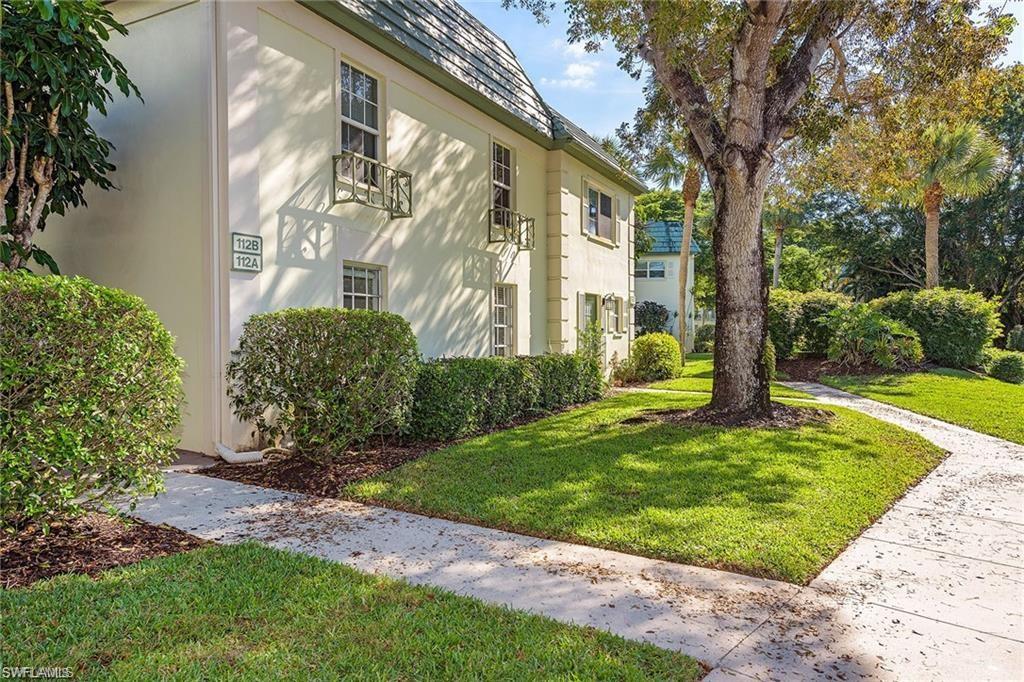 Welcome to this bright and spacious second-floor condominium in the highly desirable Naples Bath and Tennis Club. Featuring 2 bedrooms, 2 bathrooms, and approximately 1,235 square feet of living space, this well-maintained home offers comfort, functionality, and an unbeatable location in the heart of Naples.

The open-concept floor plan is filled with natural light and features a fully enclosed balcony that has been seamlessly incorporated into the interior living space, creating additional air-conditioned square footage and a dedicated formal dining area.

The split-bedroom layout provides added privacy, while the spacious primary suite offers generous closet space and a private en-suite bathroom. Additional highlights include an in-unit washer and dryer, ample storage throughout, and large windows that enhance the bright and airy feel.

Ideally located in the heart of Naples, you'll enjoy beautifully landscaped grounds and scenic walking paths while being just minutes from world-famous Gulf beaches, Downtown Naples, Mercato, Waterside Shops, premier dining, shopping, and entertainment. This is an exceptional opportunity to enjoy the best of the Naples lifestyle.
