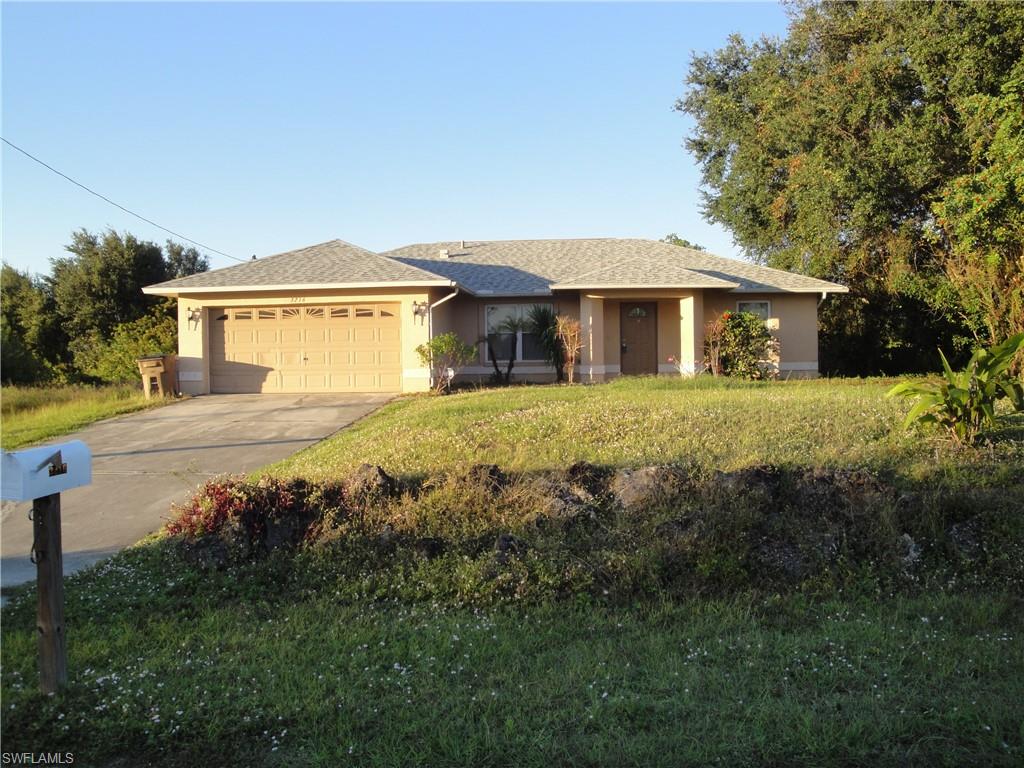 Great location in South Lehigh between Gunnery and Sunshine. Brand new roof in 2020 ! Open great room design with high cathedral ceilings and split bedrooms. All tile interior. Fully fenced back yard with chain link fencing and one single gate and one double gated entry. The windows on the back side of the home and the slider are hurricane glass. All others have manual shutters which are stored in the garage. Large master bedroom with large and long walk-in closet. The actual property line along the back of the property is about 10 feet longer than where the fence is.  Home is being sold As Is with right to inspect. The interior of the home need painting. Move in ready otherwise. Great first home or investor rental purchase.