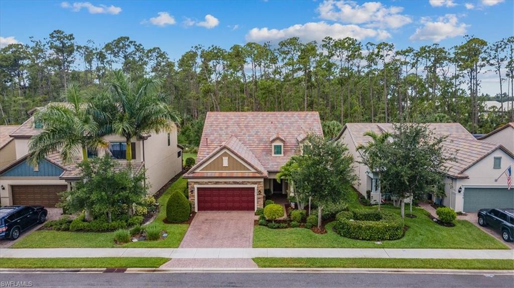 Welcome to Camden Lakes, a gated community West of 75 in North Naples. This Martin Ray model is a wonderfully versatile floor plan with an open concept design, spacious owner's suite, 2 additional bedrooms plus a den/office on the main floor. You're greeted on the second floor with a spacious loft, fourth bedroom and full bathroom. The chef's kitchen boasts seldom found natural gas cooking, a spacious walk-in pantry, granite countertops, elegant tile floors, and a stunning center island with a curved countertop, perfect for serving guests or casual dining. Soak up the Florida sunshine sitting poolside on your spacious, screened lanai with a private, preserve view and a quiet, cul-de-sac location. Rest easy knowing this immaculately maintained, move-in ready home is just six years old with new interior and exterior paint and carpeting. Low HOA fees include landscaping and landscape irrigation, heated resort style pool, fitness center and clubhouse. All A-rated schools, just 15 minutes to the airport, moments from sugary white-sand beaches, and conveniently located to shopping and entertainment options.