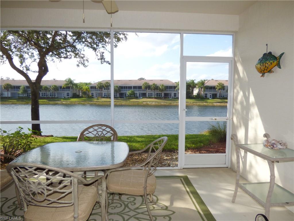 FIRST FLOOR CONDO WITH BEAUTIFUL LAKE VIEW.  See this wonderful 2 bedroom 2 bath condo. This home is TOTALLY FURNISHED.  TILE FLOORING is in the main areas and bath. NEW DESIGNER FRIENDLY CARPETING gives a fresh look to the bedrooms. The master bath has a new FRAME LESS SHOWER DOOR INSTALLED.  You'll love the furniture and accessories that compliment the home.  Wall colors are in light shades to match any decor.  As you look out your SCREENED LANAI you view a LOVELY LAKE or sit out on the lanai and enjoy the tropical wildlife and plantings. There are manual storm shutters that are easy to install. ADDITIONAL STORAGE comes with the condo.  All of this plus the beauty and wonderful lifestyle of Colonial Country Club. Golf is available on a PAY AS YOU PLAY BASIS. There is also a beautiful new clubhouse with a gorgeous main dining room and a grill room. You can take out a book at the library and there is a community room for activities. Swim in the large lap pool or in the neighborhood pool which is within walking distance. Play boccie ball or pickle ball. Eight tennis courts are also available. Lots of shopping nearby as well as the Airport. See this home today.