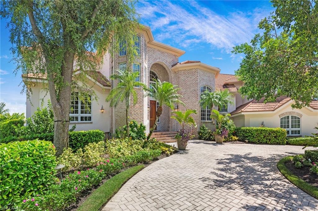 Location, location, location! Boaters' paradise with super quick direct access to the Marco River and Gulf. First time this home is being offered for resale. Oversized tip estate lot with five bedrooms, five full baths, three half baths, wonderful views of the Marco River and the waterway. Enjoy the highly desirable southeastern rear exposure from the massive heated pool and brick paver covered lanai deck. Interior features include two living rooms, a chef's kitchen with double ovens, an island, a pantry, office, formal dining room, elevator, wood flooring, grand staircase, two huge storage rooms, a spacious game room, plus two laundry rooms. Exterior features included manicured landscaping, oversized paver driveway, a four-car garage, 247 feet of seawall, two docks with lifts, a gazebo, a fire pit, and plenty of room to accommodate a large yacht. This home looks even better in person.