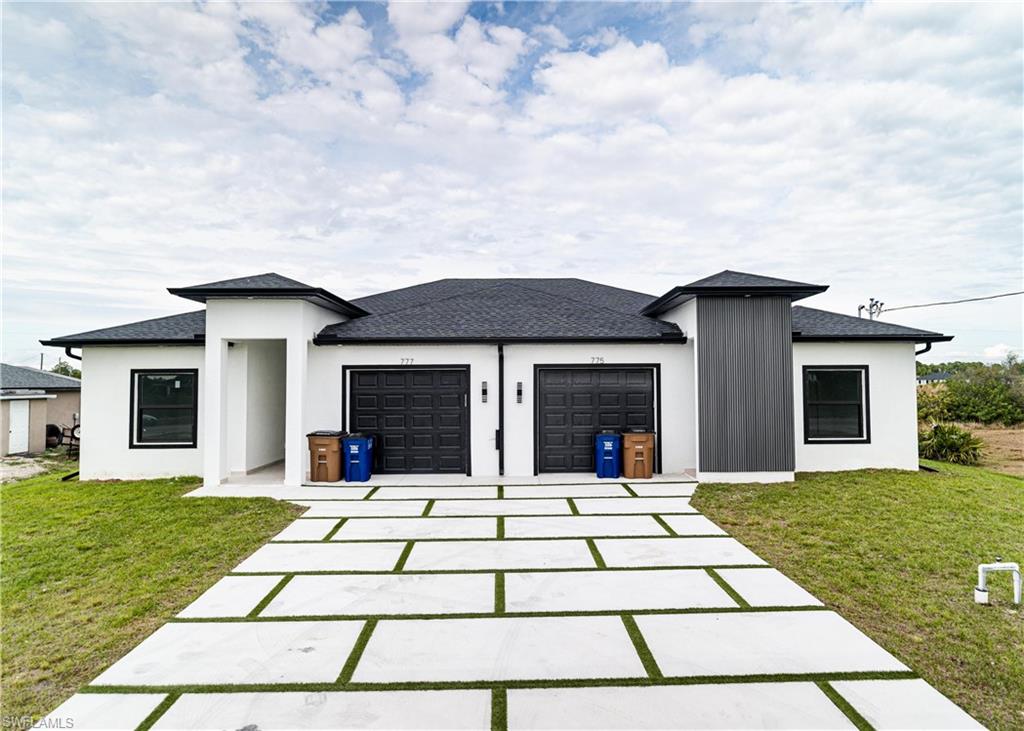 FOR-RENT- BRAND NEW DUPLEX ON ALABAMA RD! Excellent location with easy access to SR-82, shopping, dining, schools, and Fort Myers. This modern duplex features an open plan, spacious bedrooms, contemporary finishes, stainless steel appliances, in-unit laundry, and a private driveway. Don't miss this opportunity- schedule your showing today!