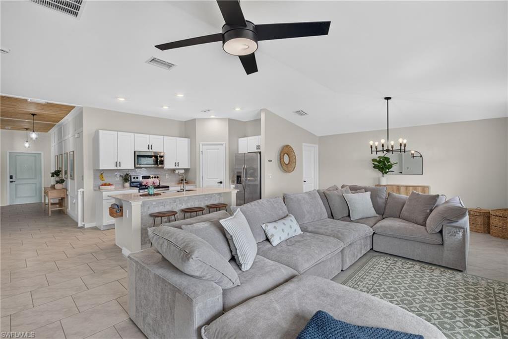 Welcome to this beautifully upgraded 3-bedroom, 2-bath home in the highly desirable Crane Landing community of North Fort Myers. Built in 2023, this move-in-ready 3/2 residence offers 1,556 square feet of thoughtfully designed living space with stylish custom touches and upgrades throughout. Step inside to discover upgraded ceiling details, designer accent walls, and modern finishes that add warmth and character to every room. The open-concept floor plan seamlessly connects the living, dining, and kitchen areas, creating the perfect space for both everyday living and entertaining. Outside, you'll find a meticulously landscaped, fenced-in backyard featuring a spacious, extended paver patio and a gazebo — ideal for hosting family gatherings, weekend barbecues, or simply relaxing while enjoying the Florida lifestyle with your lake view. The beautifully maintained outdoor space provides the perfect setting for children, pets, and entertaining guests.
Whether you're a first-time homebuyer, a growing family, or looking for a nearly new home without the wait of new construction and the expense of adding upgrades, this exceptional property offers the perfect combination of comfort, style, and functionality. Conveniently located near shopping, dining, schools, and major roadways, this Crane Landing gem is ready to welcome you home!