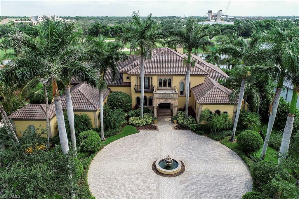 This gracious, golf course residence represents a rare opportunity to live a truly sophisticated lifestyle. Situated along the lake and expansive 7th fairway and comprised of 7,065 sq. ft. of luxurious living this home features 5 bedrooms, including a private guest cabana with private entrance, office, den/media room, 6 full/2 half baths, 3 car garage, separate golf cart garage, a completely renovated chef's kitchen providing gas cooking, side by side refrigerator/freezer, 2 dishwashers, 2 ovens, 140 bottle temperature-controlled wine storage, walk-in pantry, large island with seating and an adjacent breakfast room and custom, hand-crafted bar. Exquisite, custom-painted wall treatments, custom cabinetry and ceiling details, luxurious carpeting in bedrooms, a sophisticated Audio Visual system including low-voltage lighting, hurricane screens, all new electrical wiring and a 500 gallon buried propane tank complete the home. The outdoor space features a screened-in, covered lanai with ample seating space and a summer kitchen with grill, refrigerator and sink. Just a few steps further are the open-air swimming pool and spa positioned perfectly to capture the unspoiled views.