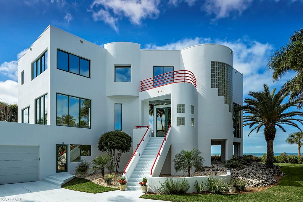 This Old Naples beachfront house situated on approximately 120 feet of beach frontage, as per plat and/or deed, reflects its owners' love of life and demand for excellence. The term “modernism” has been formally used to describe this beachfront masterpiece built by the well-known firm of D. Garrett Construction, Inc. and designed by the exceptional architectural firm of McWard Architects, Inc. As with all well-executed construction that is true to its purest conviction, the home remains today as one of the most stunning examples of true modernism … open, minimalistic, and inspiring with the intent to avoid the ornate and to focus on the clarity and meaning of the living experience. The home flows with an innovative grace that clearly reflects the owners’ warmth and welcoming personalities. Glorious light from multi level windows illuminates the vast interior open spaces and draws one to focus on the ever changing interactive drama and miraculous beauty of the beach, sea, and sky beyond.
